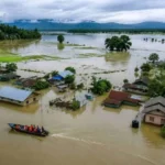 উজনিৰ বান – ইভা গন্ধীয়া ফুকন 